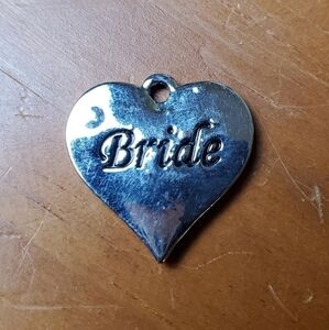 NWOT charm, silver colored heart with Bride engraved